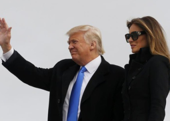 Tổng thống Mỹ đắc cử Donald Trump và vợ Melania Trump tới Washington ngày 19/1 để chuẩn bị cho lễ nhậm chức vào ngày 20/1 - Ảnh: Reuters.